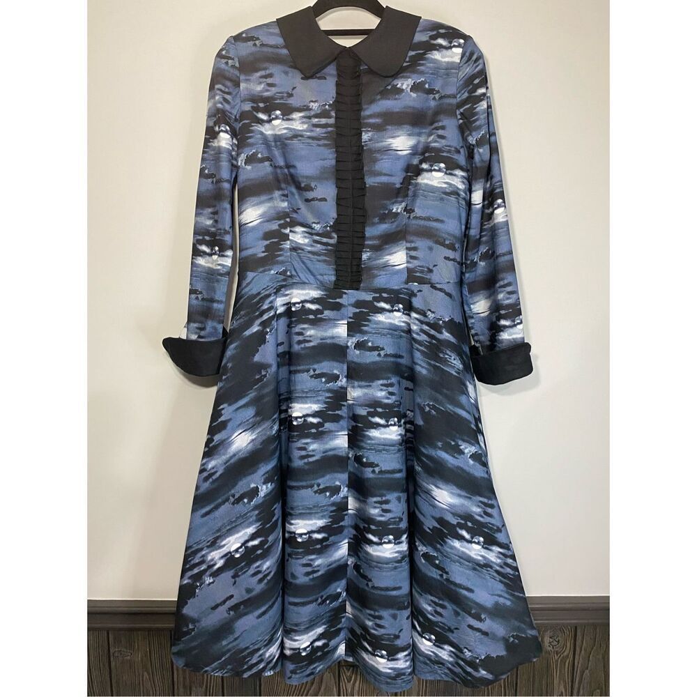 Size L/XL, Blackbird Studios slow fashion in blue and black celestial print.